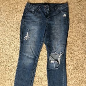 Distressed and well-worn cropped jeans